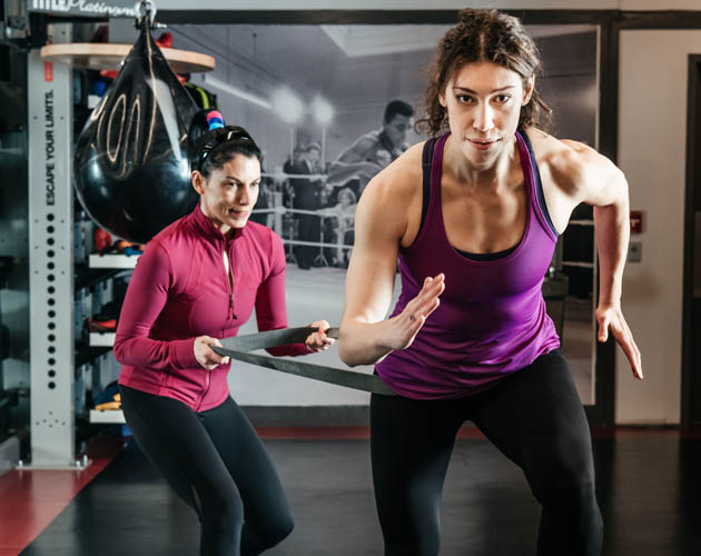 Group Fitness Director - Lauren - and Group Ex Instructor - Lori - in the Strength Gym