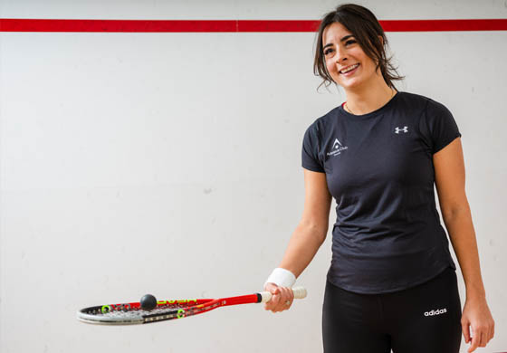 Woman playing squash at the Adelaide Club