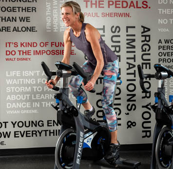 Meg on a Stages bike in our RIDE Studio