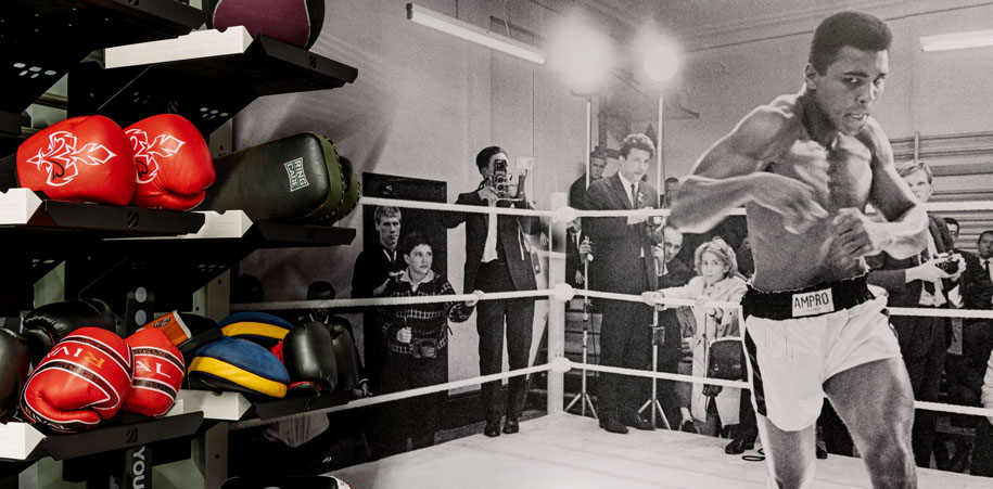 Boxing space at the Club with equipment and Ali mural