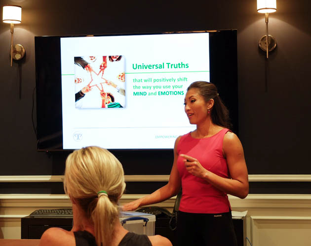 Woman giving presentation at the Cambridge Club