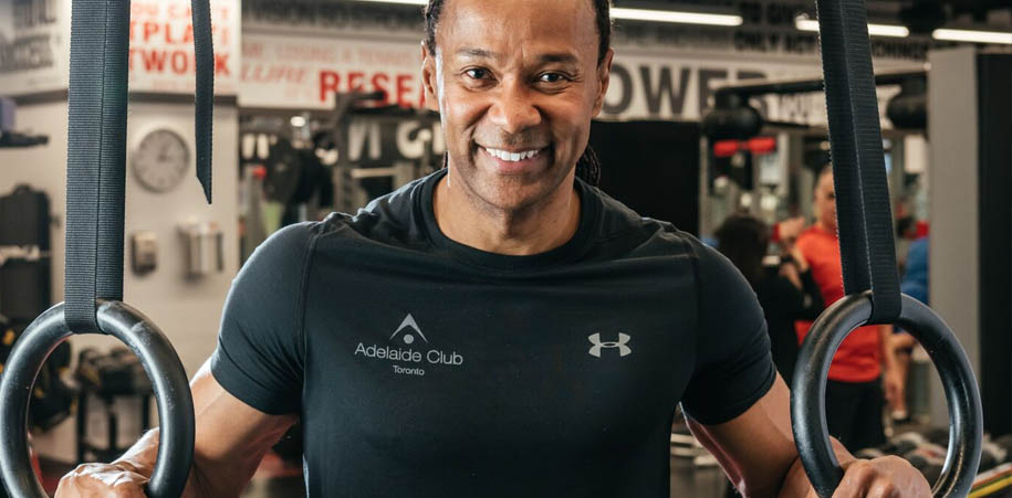Garth wearing black Adelaide Club branded t-shirt at the rings