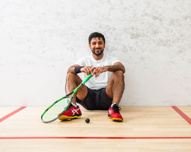 Male Member sitting on a court at the Adelaide Club