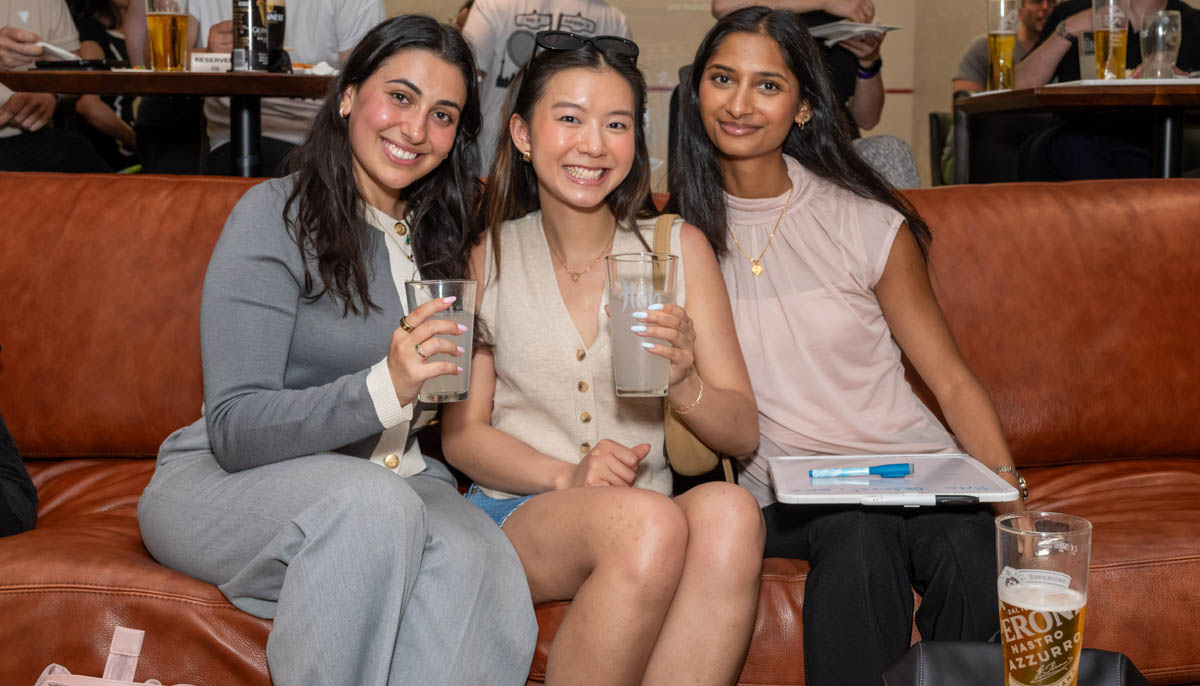 Adelaide Club Members connecting at a trivia night in downtown Toronto, showcasing the Club's vibrant community, networking opportunities, and member experiences.