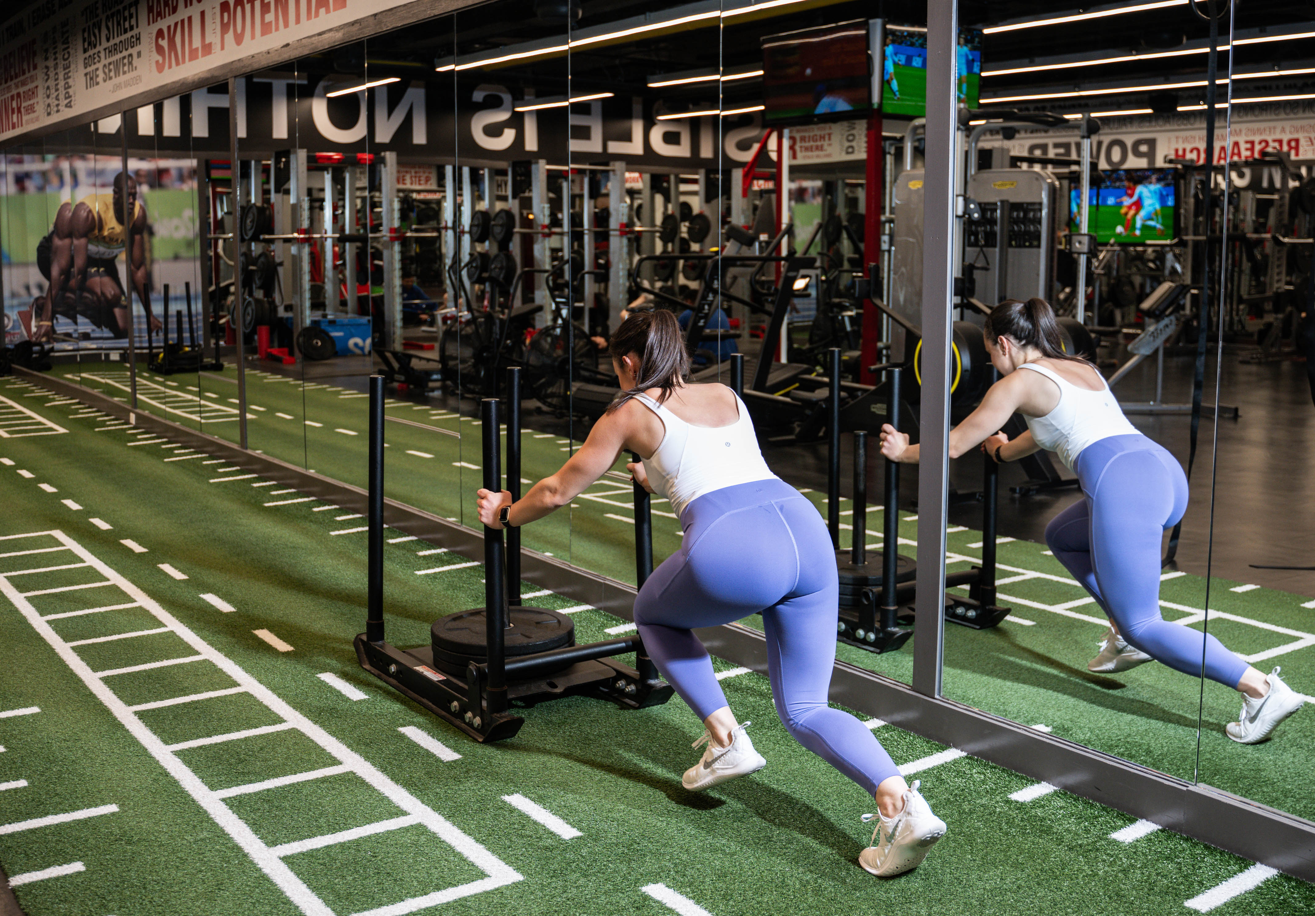 Fit woman on the turf in the Strength Gym at the Adelaide Club