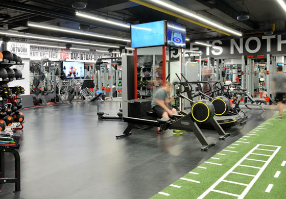 Blurred man sitting on the rowing machine in the Strength Gym at the Adelaide Club